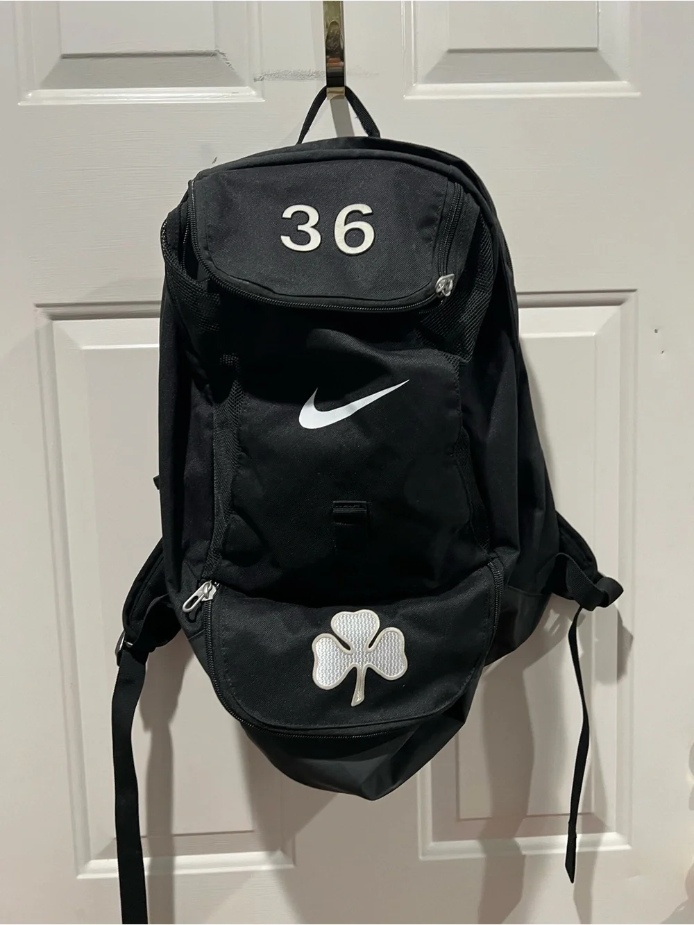 Nike Black Backpack with White Swoosh, 36 and Clover Patch